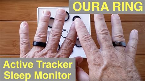 oura ring on finger.